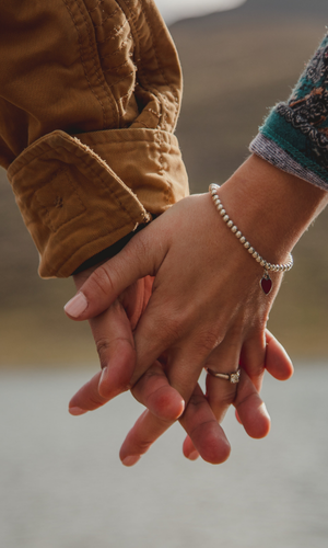 couple holding hands